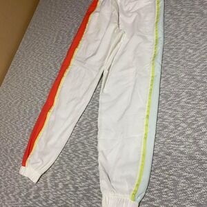 Nike white sportswear track pants with orange and yellow women XS. SKU-A146